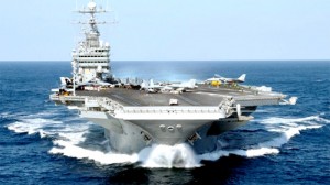 O USS Nimitz posiciona-se ao largo, na costa do Irã, de onde passa a exercer uma ação predatória mais eficaz