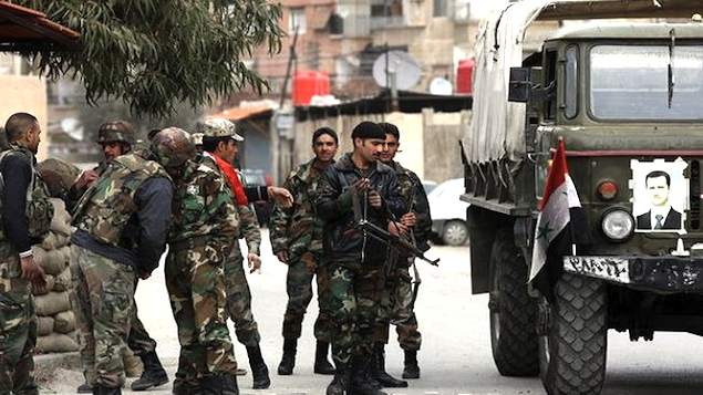 As forças do governo sírio anunciaram que vão assumir nesta quinta-feira o controle total sobre Homs