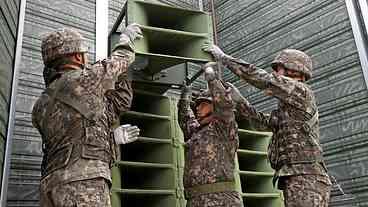 Seul retira alto-falantes de propaganda na fronteira