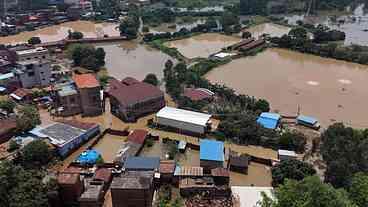 Enchentes no Norte da China: 13 Mortos e Contagem Crescente