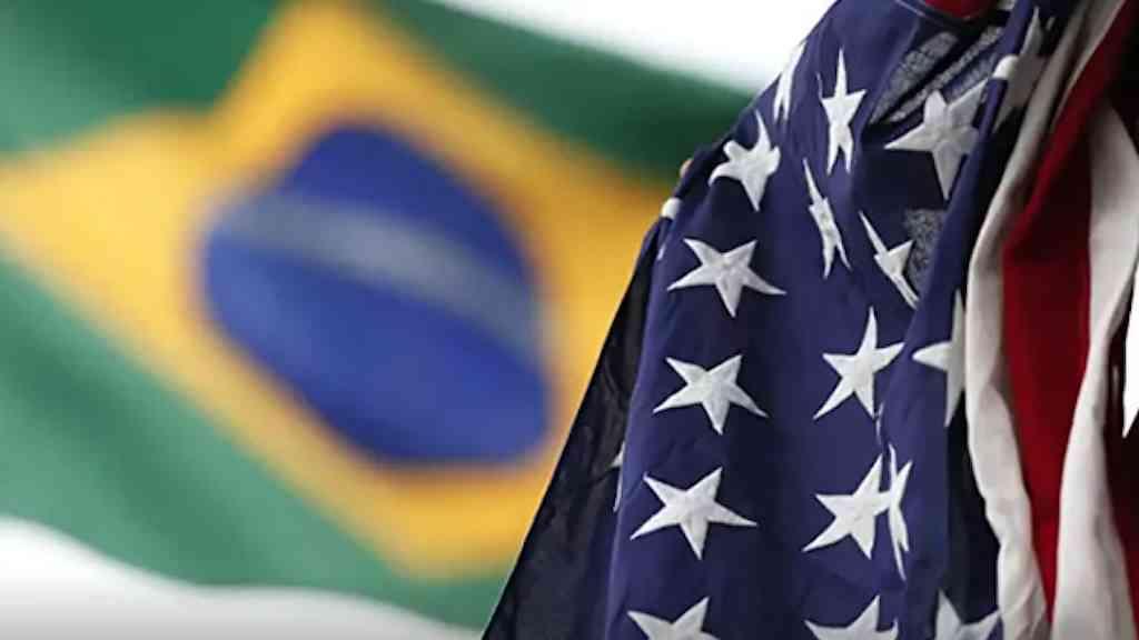 Empresa nacional vs Empresa estrangeira | Bandeiras do Brasil e dos Estados Unidos