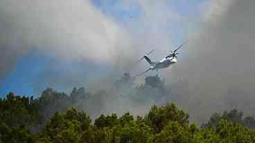 Incêndios avançam no sul da França em meio a nova onda de...