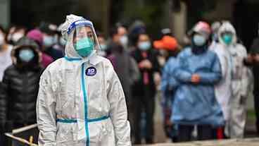 Xangai nega rumores de confinamento, infecções diárias se aproximam de mil