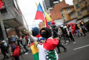 Manifestantes protestam em Bogotá em dezembro